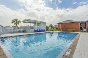 community pool featuring fence