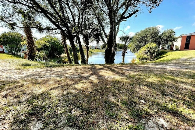 view of yard with a water view