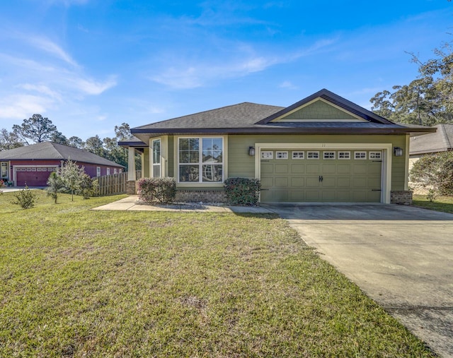 view of front of house with an attached garage, a front lawn, concrete driveway, and brick siding