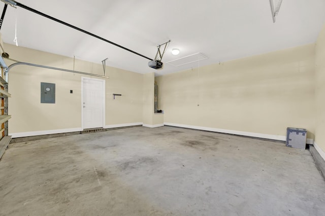 garage with baseboards, electric panel, and a garage door opener