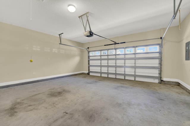 garage with baseboards, electric panel, and a garage door opener