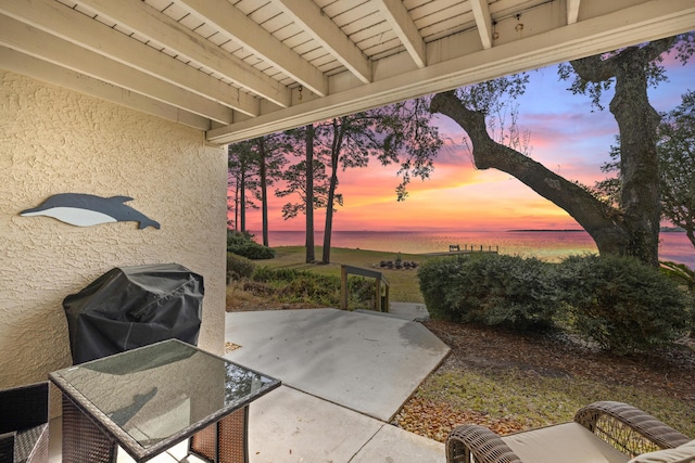 patio terrace at dusk with grilling area