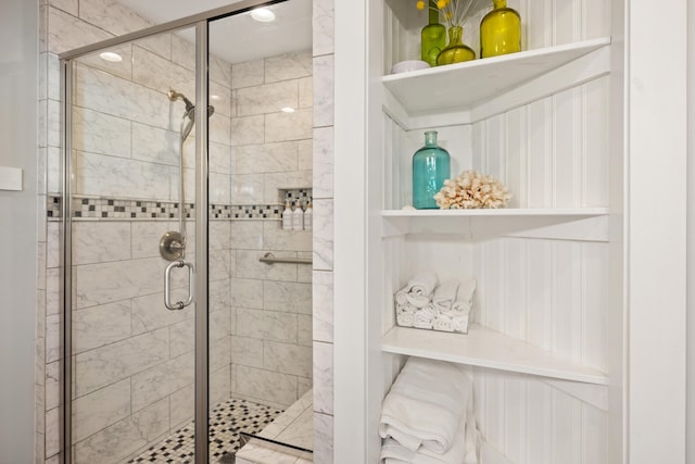 bathroom featuring a shower stall