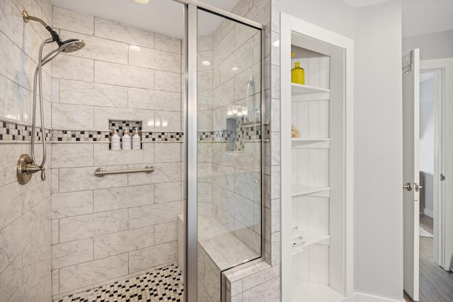 full bathroom with a shower stall