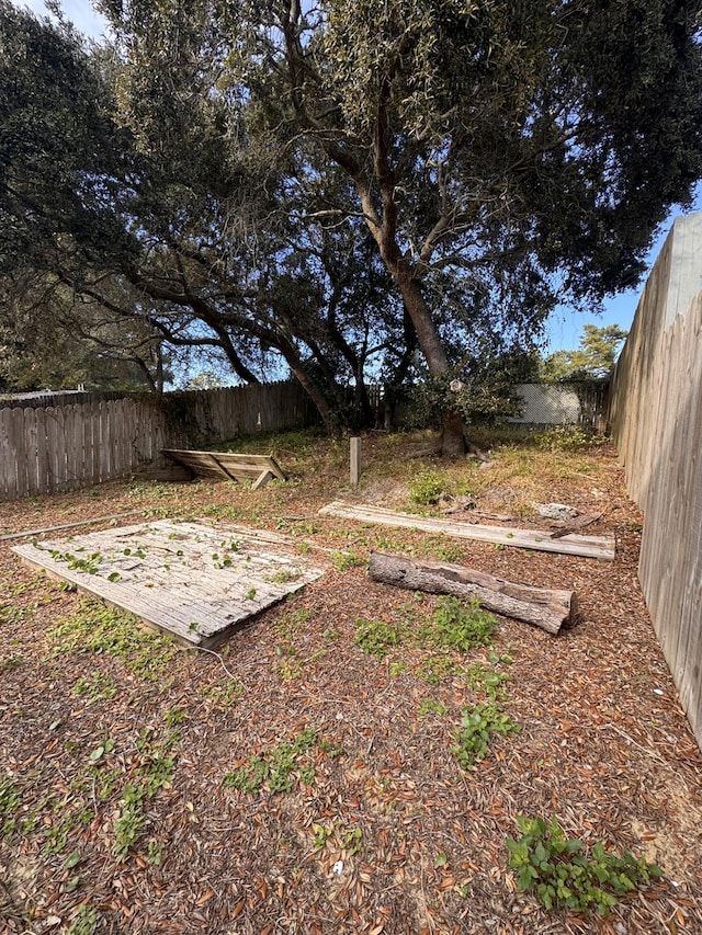 view of yard with a fenced backyard