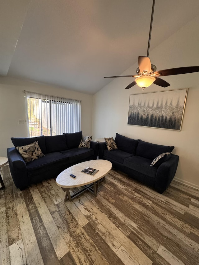 living room with a ceiling fan, lofted ceiling, and wood finished floors