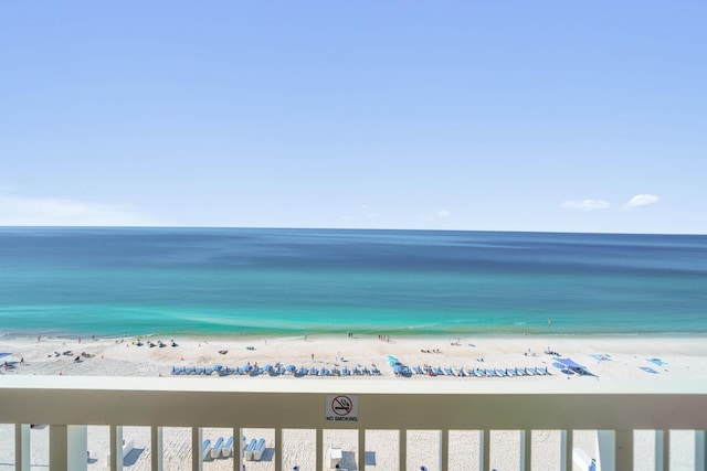 view of water feature with a beach view