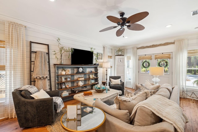 living room featuring visible vents, recessed lighting, ceiling fan, and wood finished floors