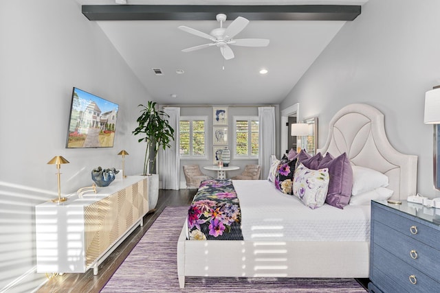 bedroom with vaulted ceiling, dark wood-type flooring, visible vents, and a ceiling fan