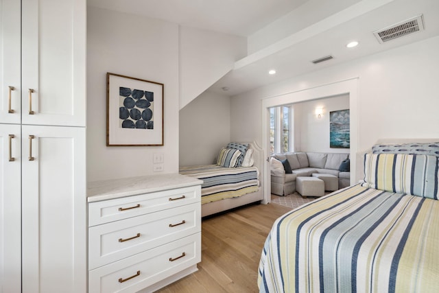 254 E Yacht Pond Ln, Watersound, FL 32461 - bedroom with recessed lighting, light wood-style floors, and visible vents
