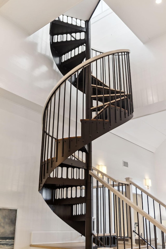 254 E Yacht Pond Ln, Watersound, FL 32461 - staircase featuring visible vents and a high ceiling