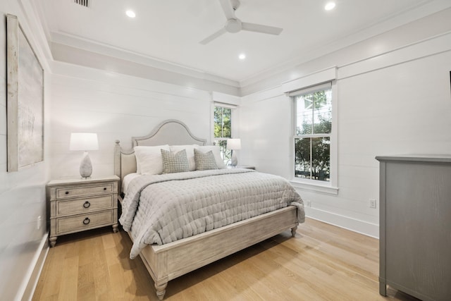 254 E Yacht Pond Ln, Watersound, FL 32461 - bedroom featuring a ceiling fan, ornamental molding, baseboards, and light wood-style floors