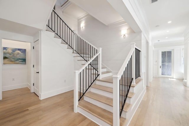 254 E Yacht Pond Ln, Watersound, FL 32461 - staircase with baseboards, recessed lighting, wood finished floors, and ornamental molding