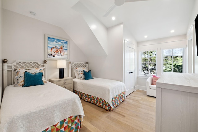 254 E Yacht Pond Ln, Watersound, FL 32461 - bedroom featuring vaulted ceiling, recessed lighting, and light wood finished floors