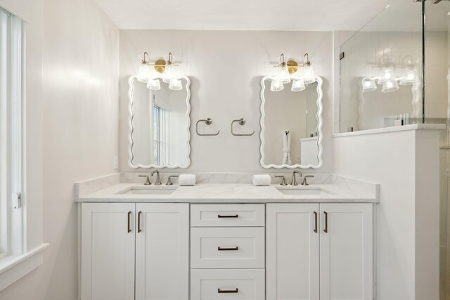 254 E Yacht Pond Ln, Watersound, FL 32461 - full bath with double vanity, a sink, and a shower