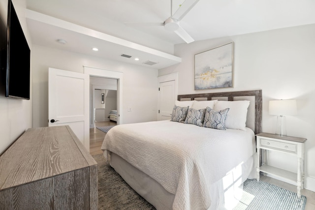 254 E Yacht Pond Ln, Watersound, FL 32461 - bedroom with visible vents, recessed lighting, and wood finished floors