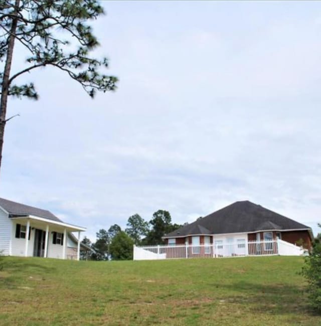 view of yard featuring fence