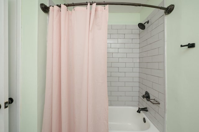 full bathroom with shower / bath combo