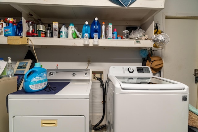 washroom with washer and dryer and laundry area