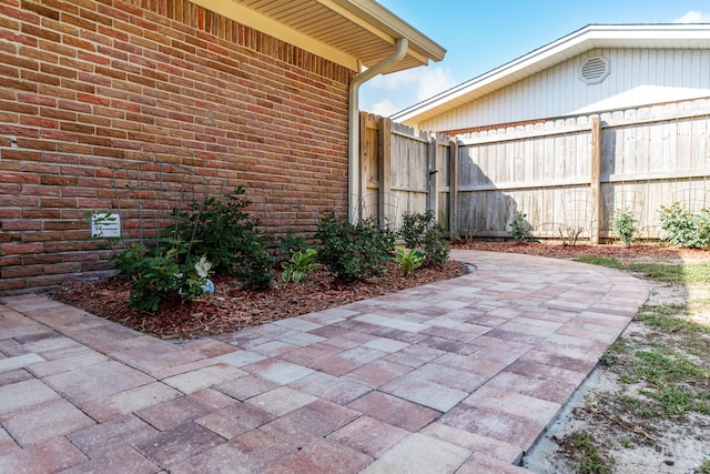 view of patio / terrace featuring fence