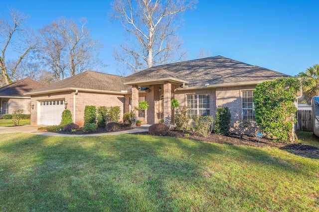 ranch-style house with driveway, roof with shingles, a front lawn, a garage, and brick siding