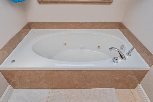 bathroom with a whirlpool tub