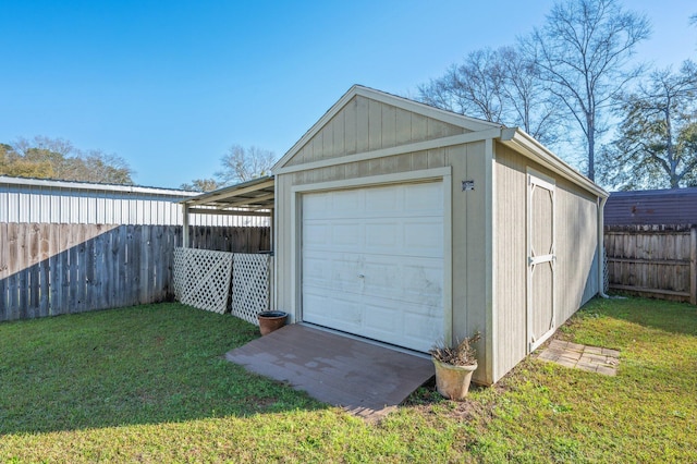 garage with fence