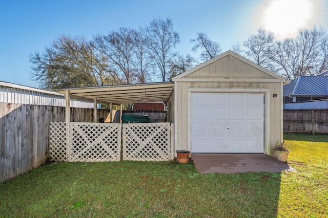 detached garage featuring fence