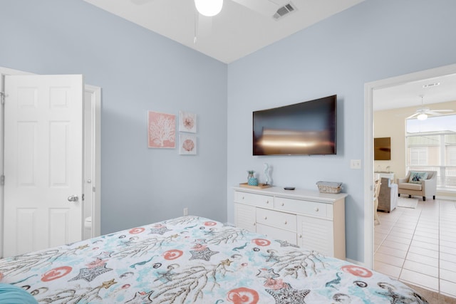 bedroom featuring tile patterned flooring and visible vents