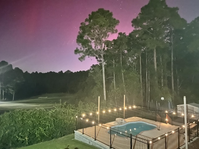 view of pool with fence and a fenced in pool