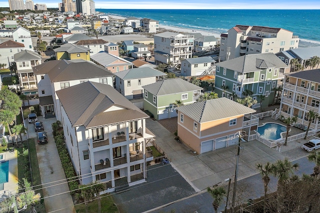 bird's eye view featuring a residential view and a water view