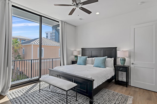 bedroom featuring visible vents, light wood-type flooring, recessed lighting, a ceiling fan, and access to outside