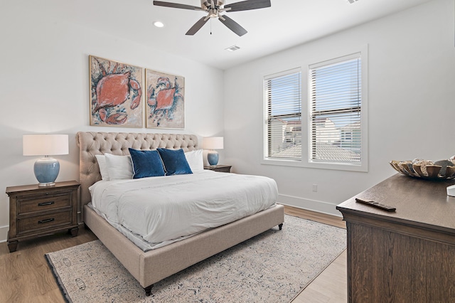 bedroom featuring visible vents, baseboards, ceiling fan, recessed lighting, and light wood-style floors