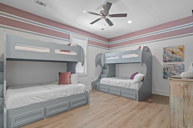 bedroom featuring visible vents, a ceiling fan, recessed lighting, light wood finished floors, and baseboards