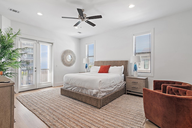 bedroom featuring visible vents, recessed lighting, light wood-style flooring, a ceiling fan, and access to outside