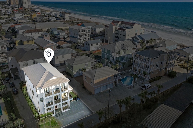 aerial view with a beach view and a water view