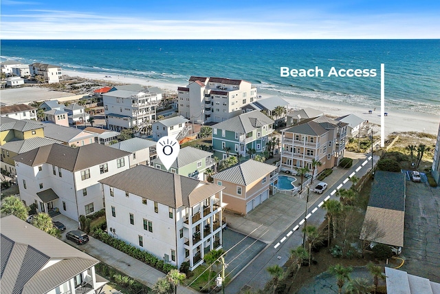 aerial view featuring a beach view and a water view