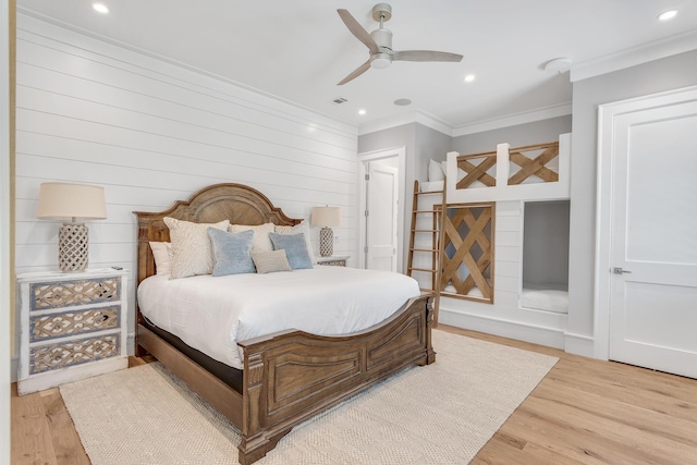 bedroom with crown molding, light wood-style flooring, recessed lighting, and visible vents