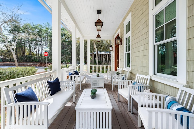 11 Dandelion Dr, Santa Rosa Beach, FL 32459 - wooden terrace featuring a porch and an outdoor living space