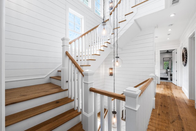 11 Dandelion Dr, Santa Rosa Beach, FL 32459 - stairs with plenty of natural light, wood-type flooring, ceiling fan, and recessed lighting