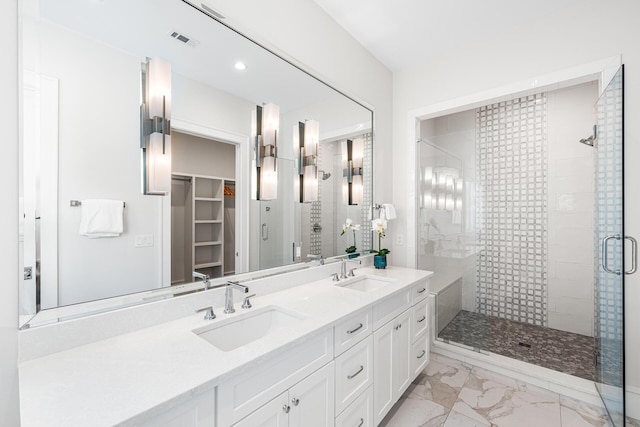 11 Dandelion Dr, Santa Rosa Beach, FL 32459 - full bath featuring a stall shower, marble finish floors, a walk in closet, double vanity, and recessed lighting