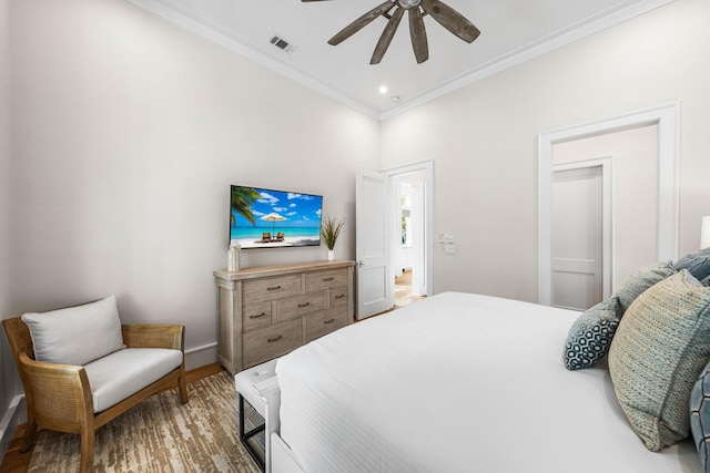 11 Dandelion Dr, Santa Rosa Beach, FL 32459 - bedroom featuring crown molding, wood finished floors, baseboards, and ceiling fan