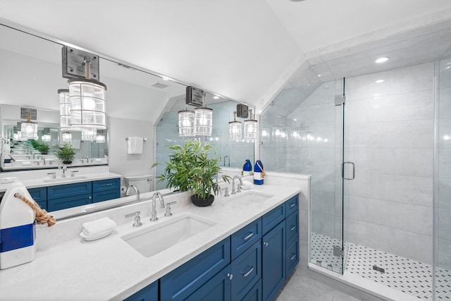 11 Dandelion Dr, Santa Rosa Beach, FL 32459 - full bathroom with a shower stall, lofted ceiling, and double vanity