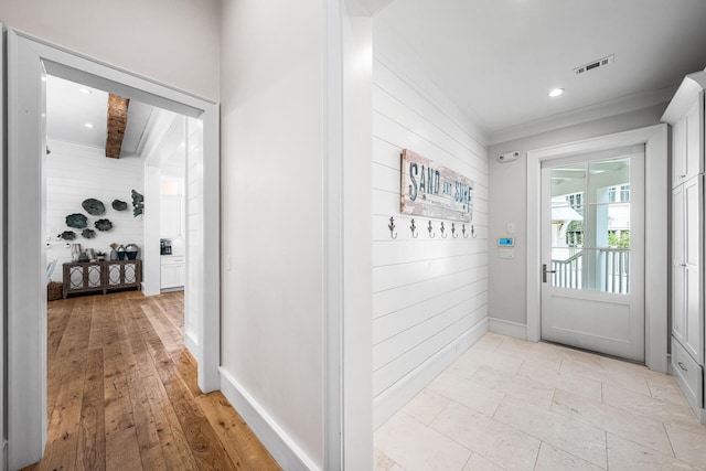 11 Dandelion Dr, Santa Rosa Beach, FL 32459 - hall featuring wood walls, crown molding, baseboards, and recessed lighting