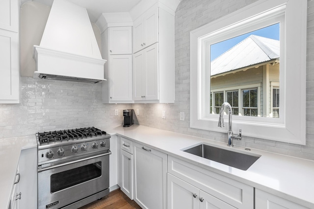11 Dandelion Dr, Santa Rosa Beach, FL 32459 - kitchen with premium stove, premium range hood, a sink, and light countertops