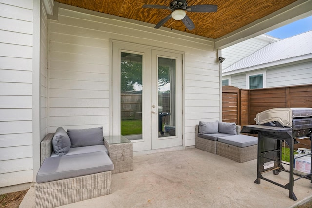 view of patio / terrace with grilling area, french doors, fence, and ceiling fan