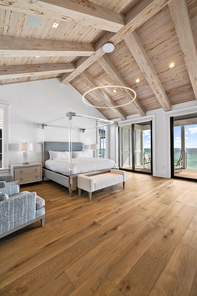 bedroom featuring hardwood / wood-style floors, lofted ceiling with beams, access to exterior, and wooden ceiling