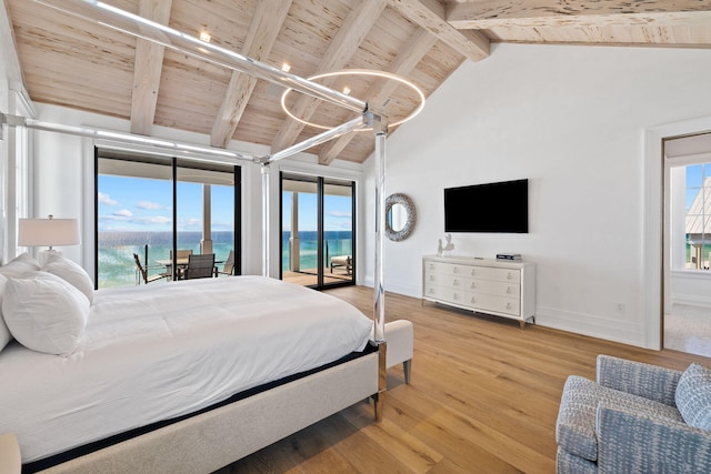 bedroom with wood finished floors, access to outside, multiple windows, and wood ceiling