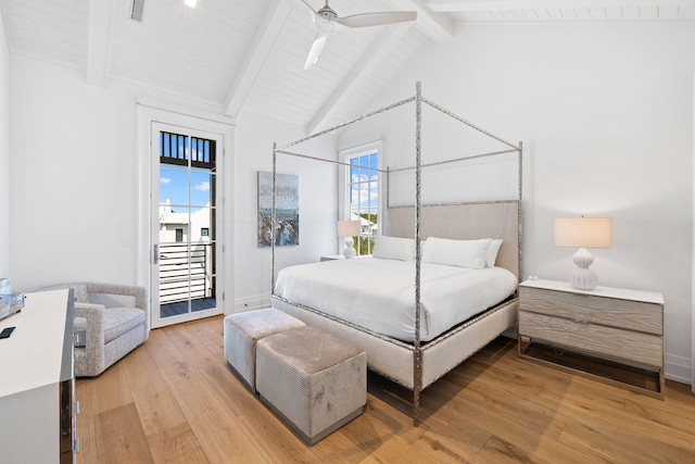 bedroom with vaulted ceiling with beams, baseboards, ceiling fan, light wood-type flooring, and access to outside