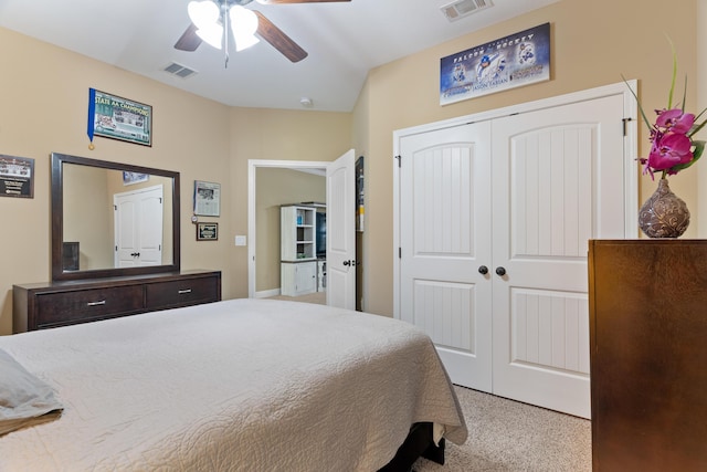 bedroom with visible vents, a closet, and a ceiling fan